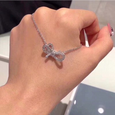 Swarovski Lifelong Bow Pendant Necklace, Rhodium Plated Crystal