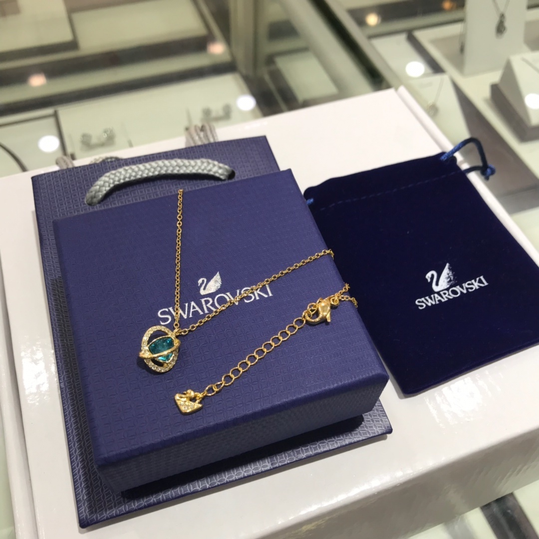 Swarovski Gold-Tone Blue Crystal Pavé Orb Pendant Necklace for Women