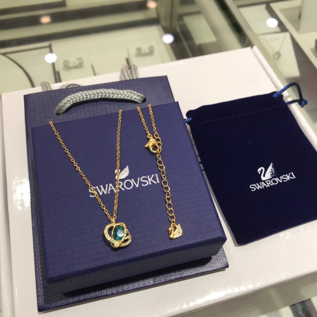 Swarovski Gold-Tone Blue Crystal Pavé Orb Pendant Necklace for Women