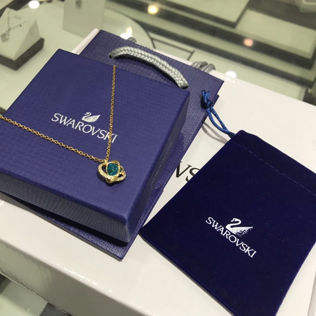 Swarovski Gold-Tone Blue Crystal Pavé Orb Pendant Necklace for Women