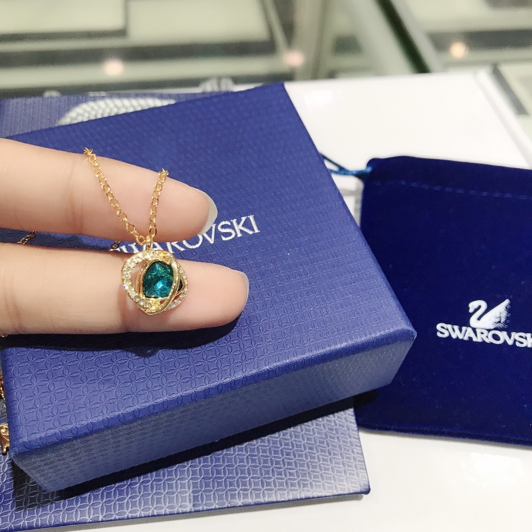 Swarovski Gold-Tone Blue Crystal Pavé Orb Pendant Necklace for Women