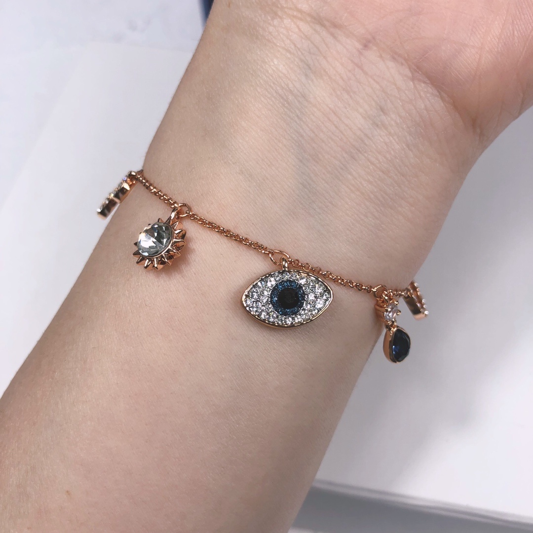 Rose Gold Evil Eye & Sun Charm Bracelet with Crystal Accents