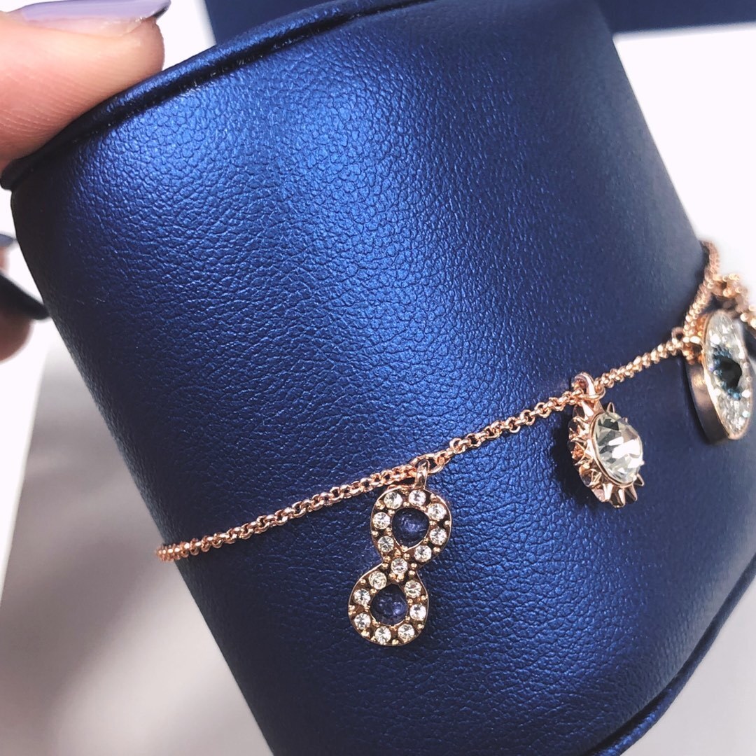 Rose Gold Evil Eye & Sun Charm Bracelet with Crystal Accents