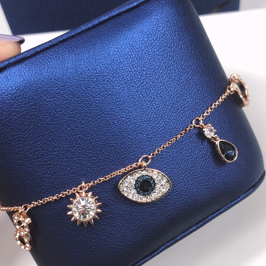 Rose Gold Evil Eye & Sun Charm Bracelet with Crystal Accents