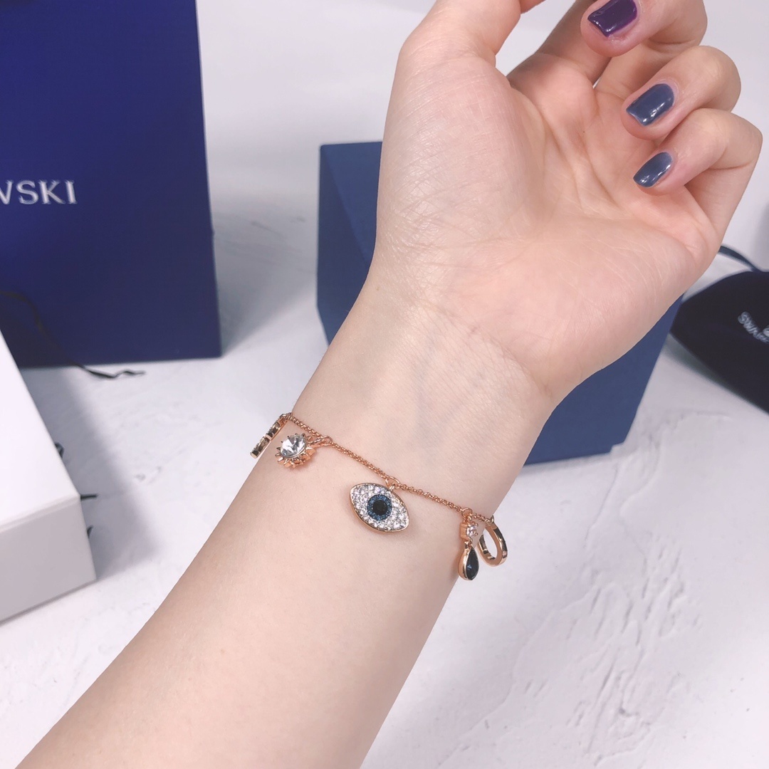 Rose Gold Evil Eye & Sun Charm Bracelet with Crystal Accents