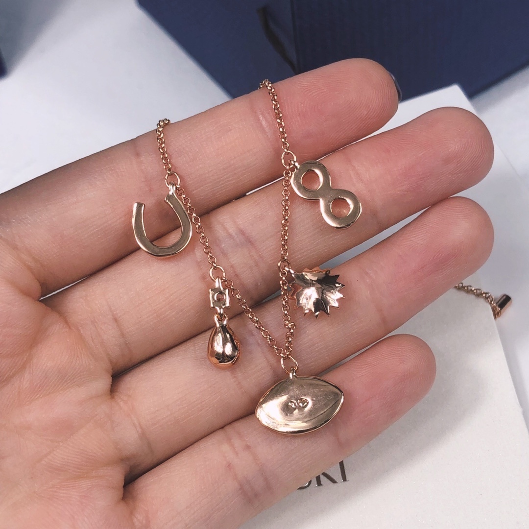 Rose Gold Evil Eye & Sun Charm Bracelet with Crystal Accents