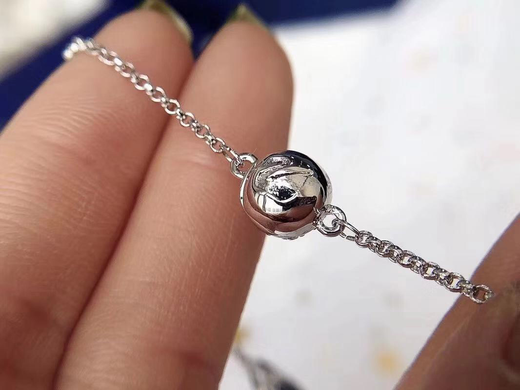 Elegant Silver Charm Bracelet with Unique Charms