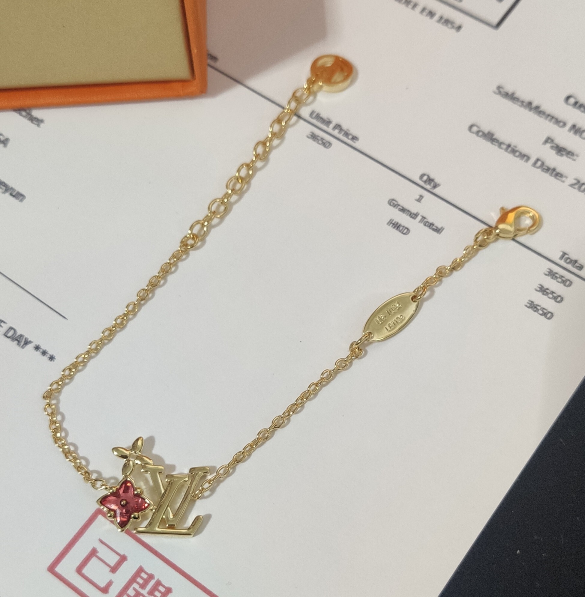 Luxury Gold Charm Bracelet with Ruby Accent