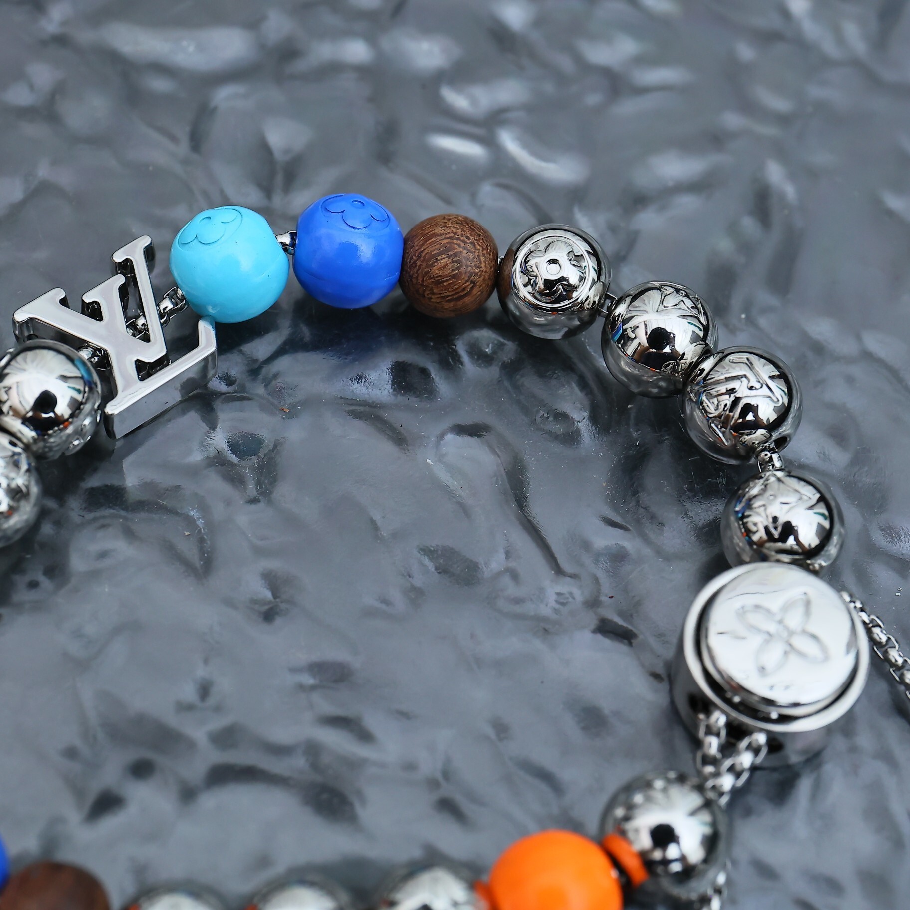Premium Beaded Bracelet with Iconic Logo Charm
