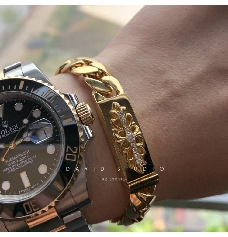 Gold Cuban Link Bracelet with Floral Diamond Accent