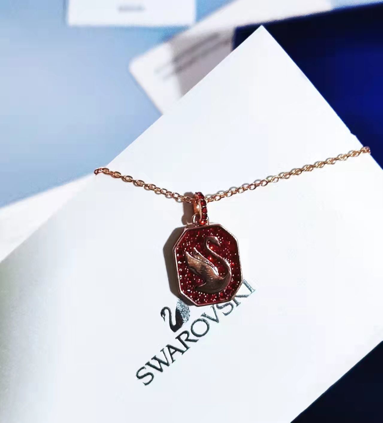 Swarovski Rose Gold Swan Pendant – Red Crystal Accent