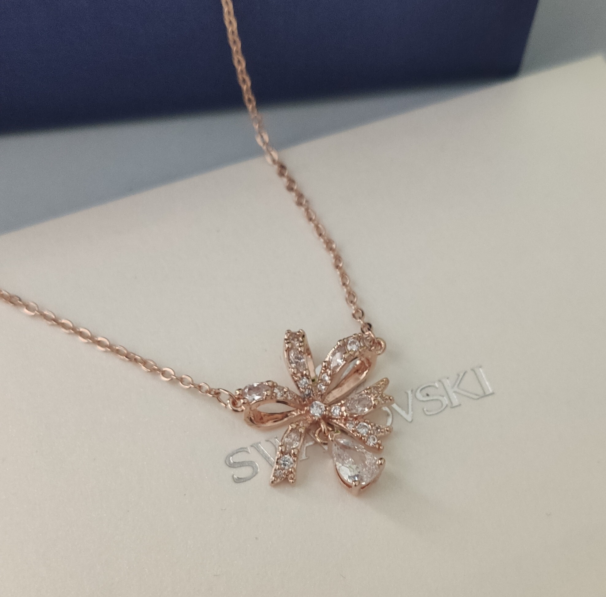 Swarovski Rose Gold Ribbon Pendant Necklace – Crystal Accents