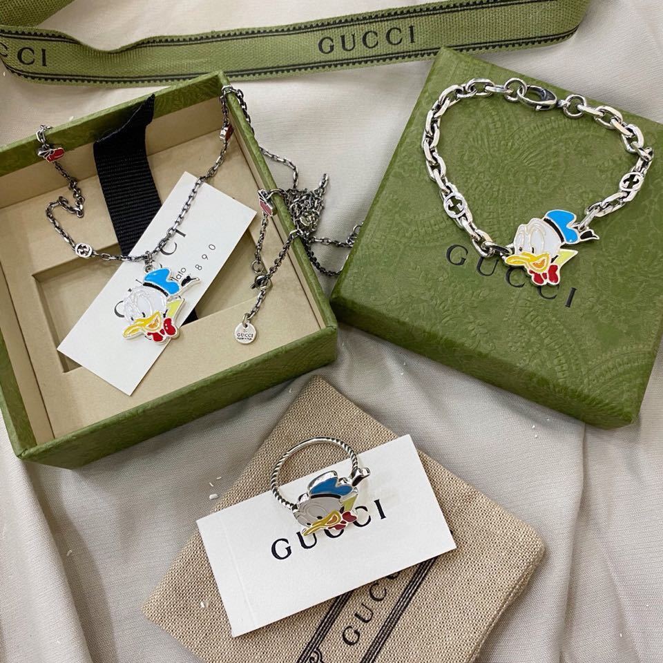 Gucci Silver Donald Duck Jewelry Set - Necklace, Bracelet, Ring