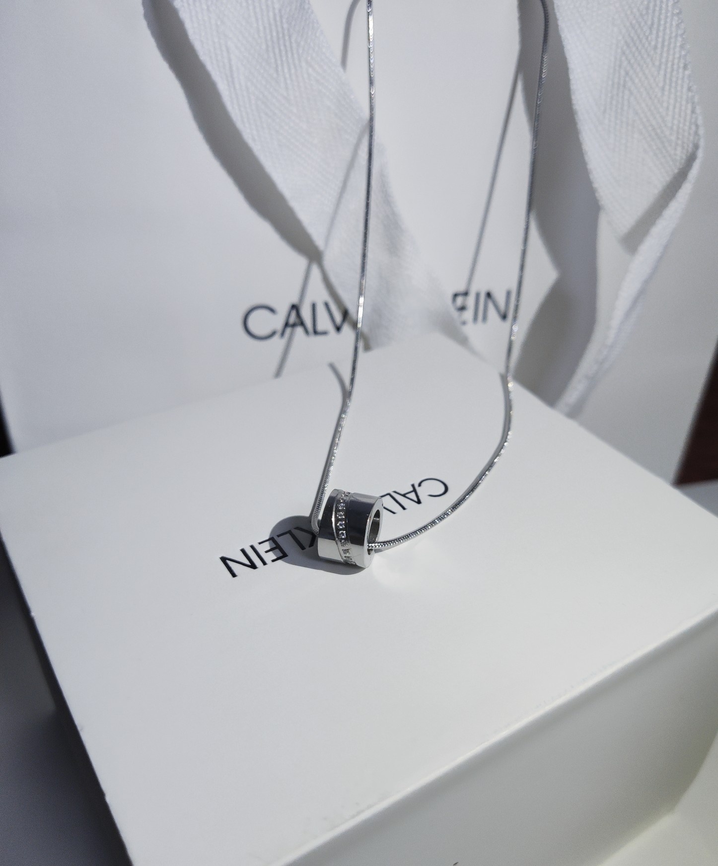 Calvin Klein Silver Cylinder Necklace – Crystal Accent
