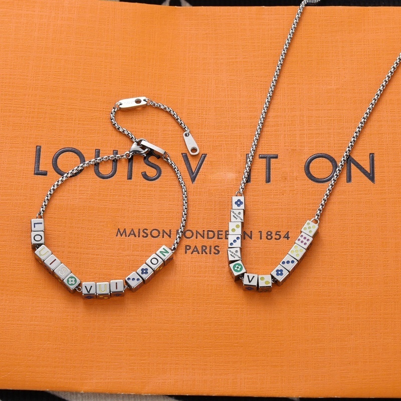 Louis Vuitton Silver Dice Charm Set – Necklace & Bracelet
