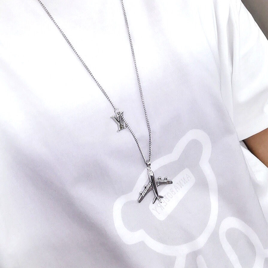 LV Silver Airplane Pendant Necklace – Unique Design