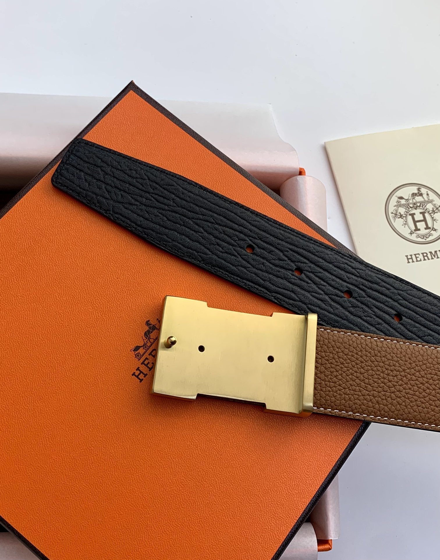 Hermès Reversible H Buckle Leather Belt - Black and Gold