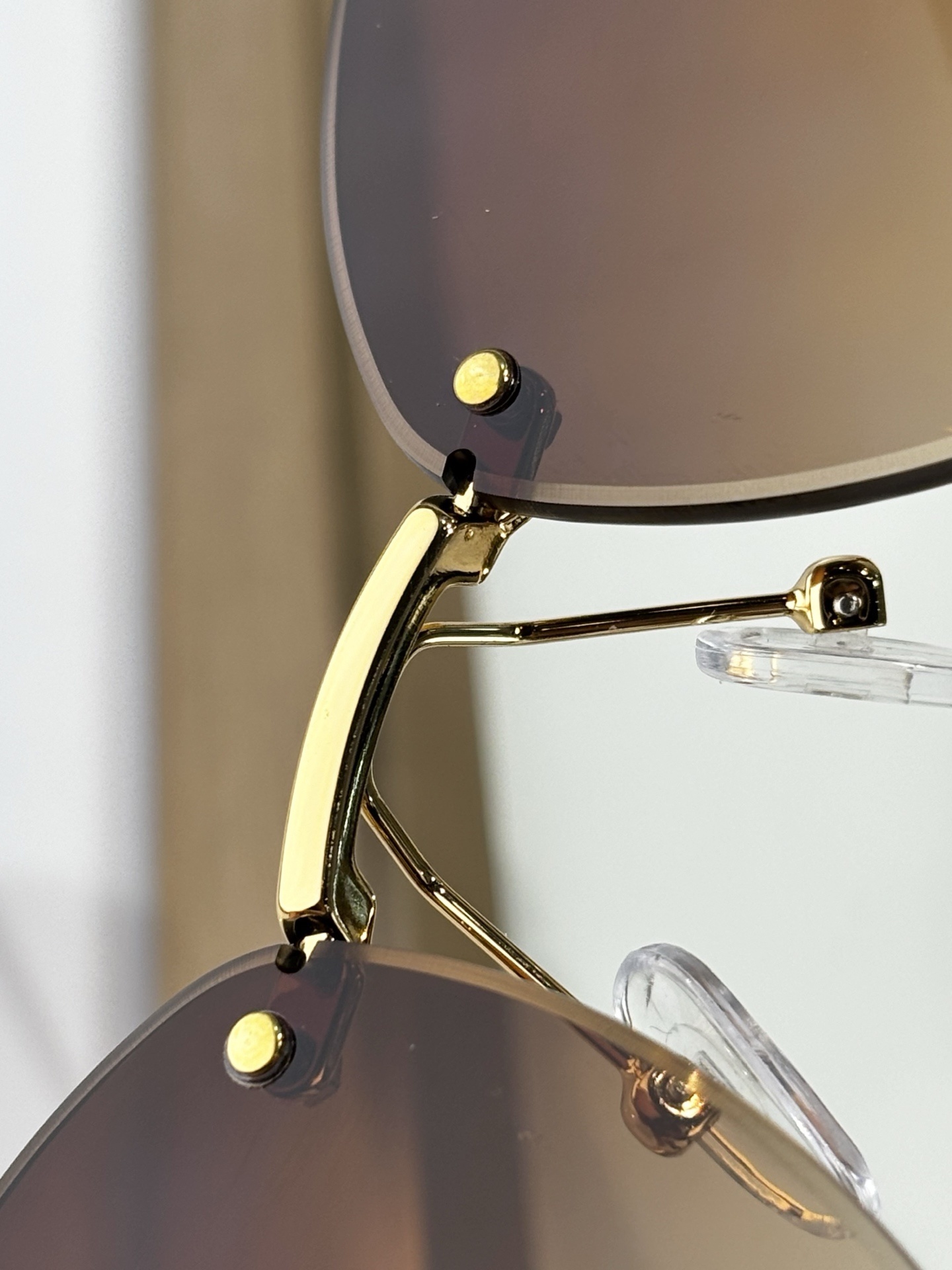 Hermes Luxury Rimless Sunglasses – Brown Gradient Lenses for Women