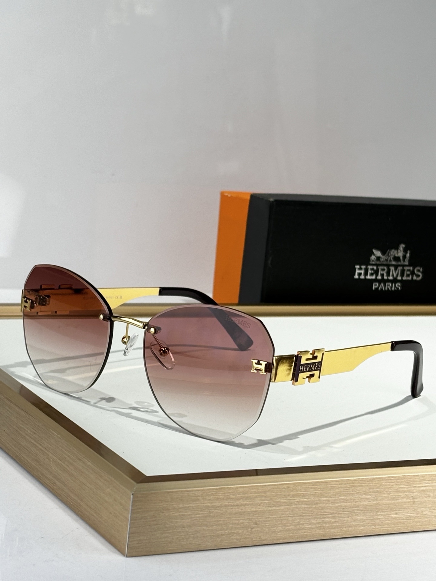 Hermes Luxury Rimless Butterfly Sunglasses with Gold H-Logo