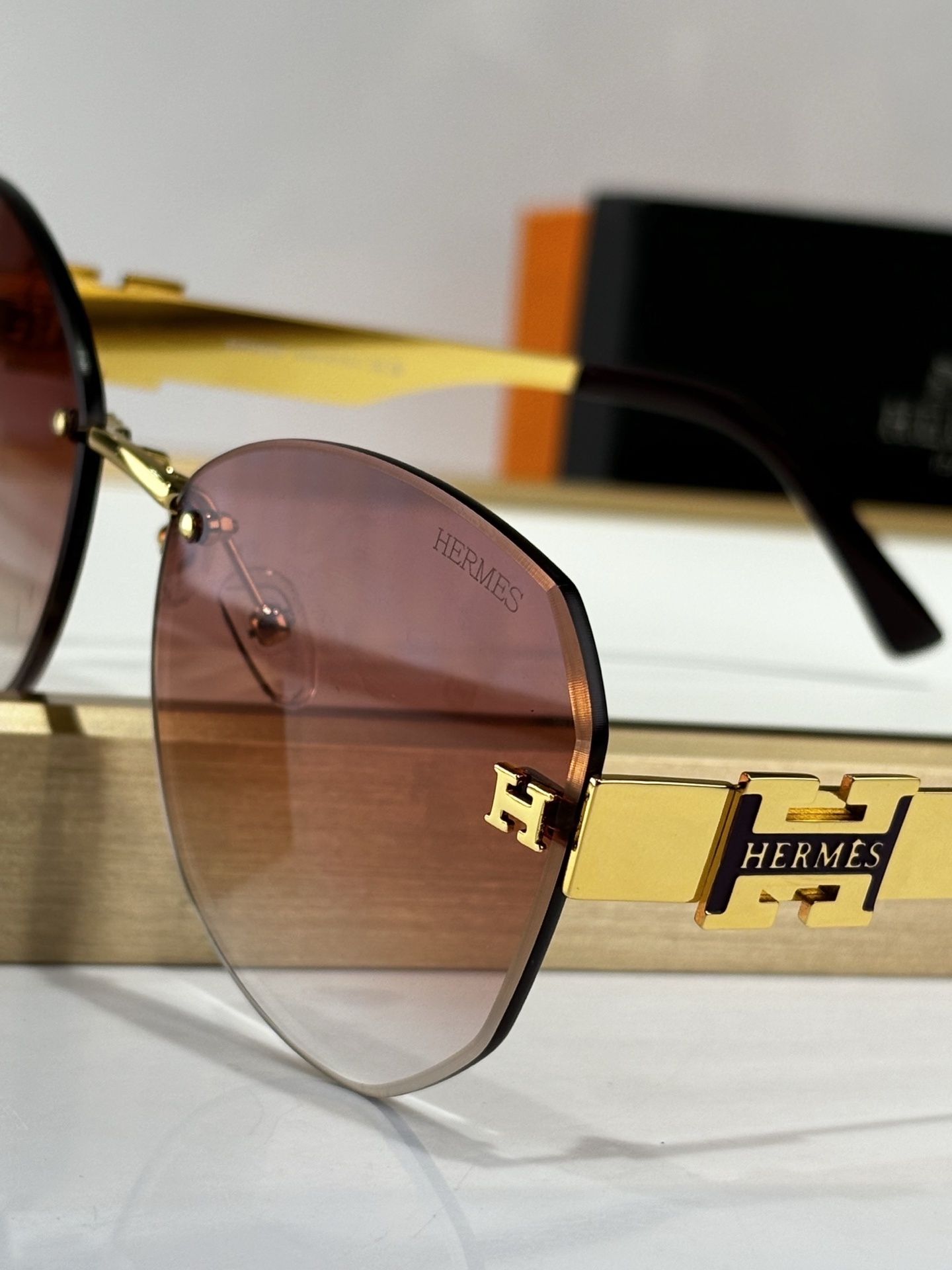 Hermes Luxury Rimless Butterfly Sunglasses with Gold H-Logo