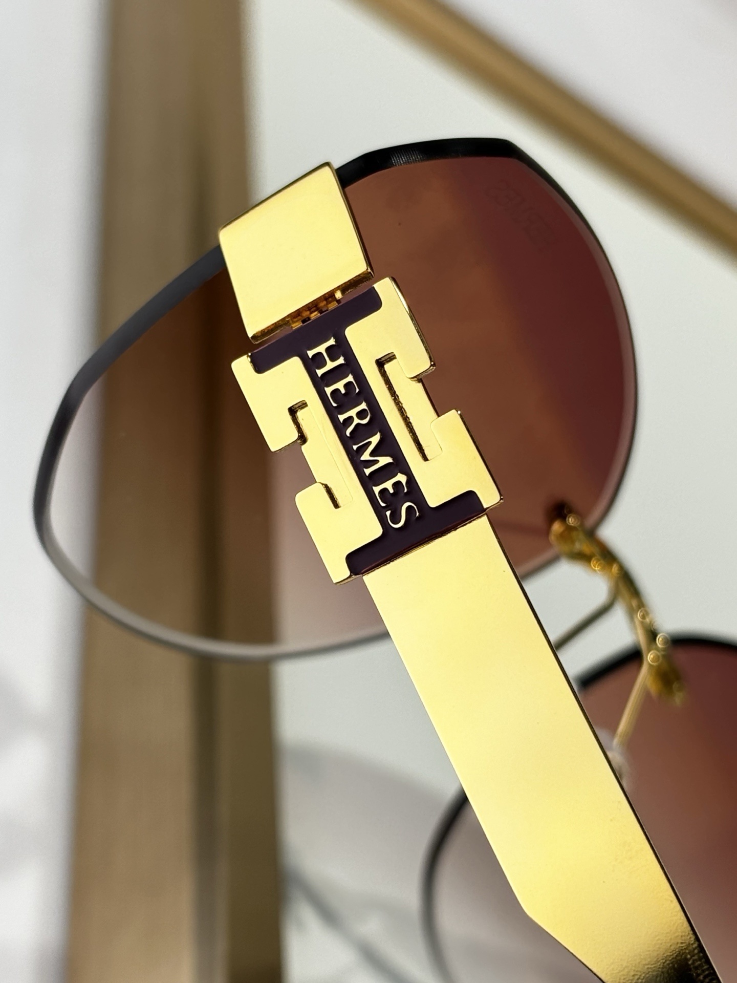 Hermes Luxury Rimless Butterfly Sunglasses with Gold H-Logo
