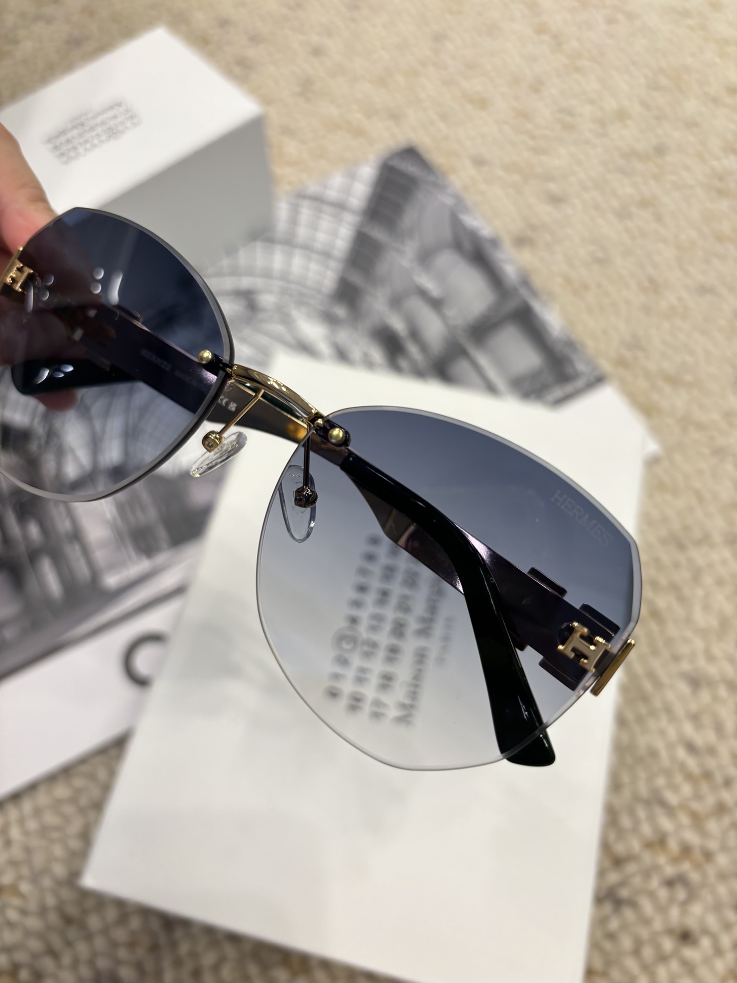 Hermes Rimless Cat-Eye Sunglasses with Gold H Logo & Blue Gradient