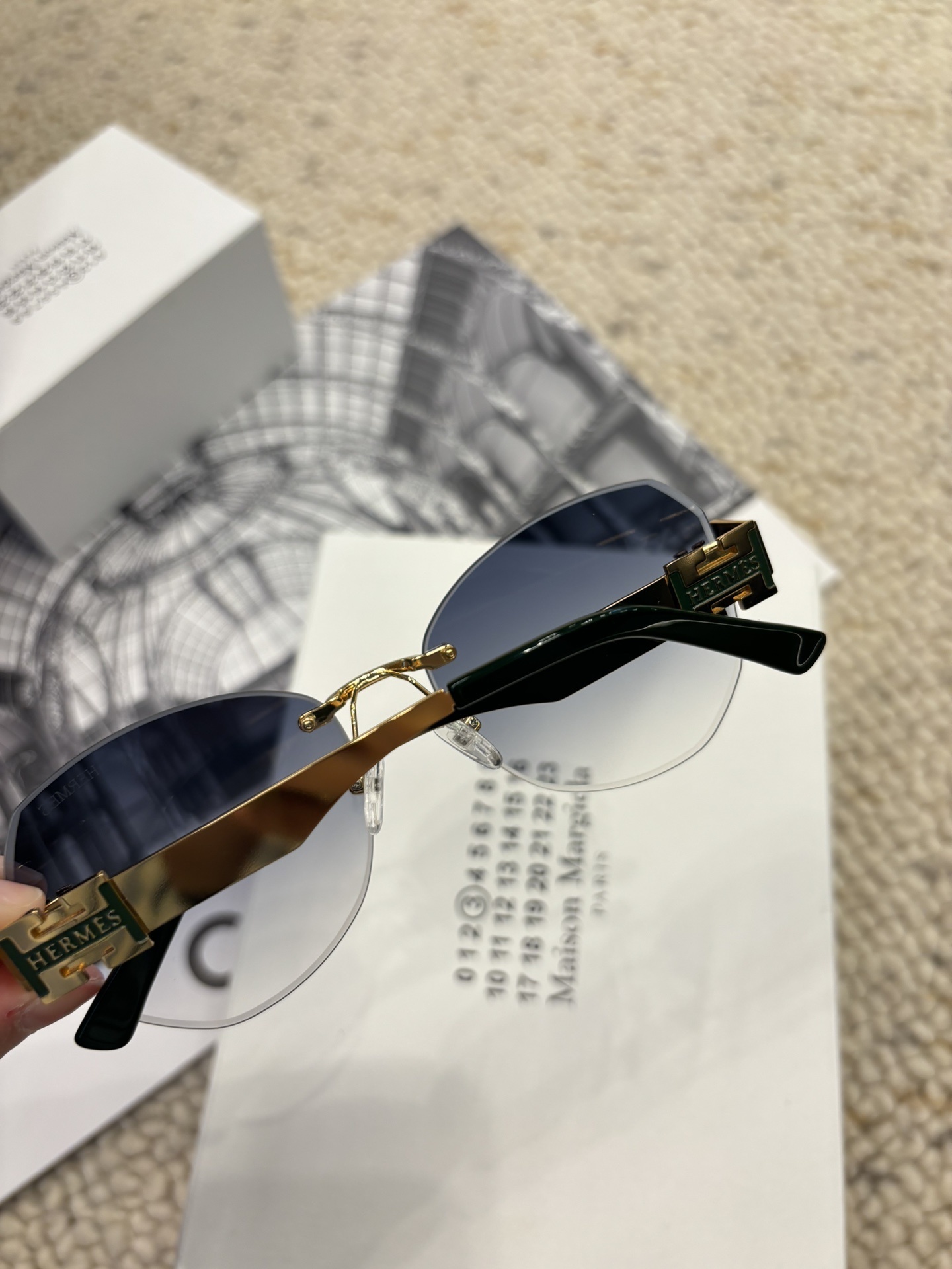 Hermes Rimless Cat-Eye Sunglasses with Gold H Logo & Blue Gradient