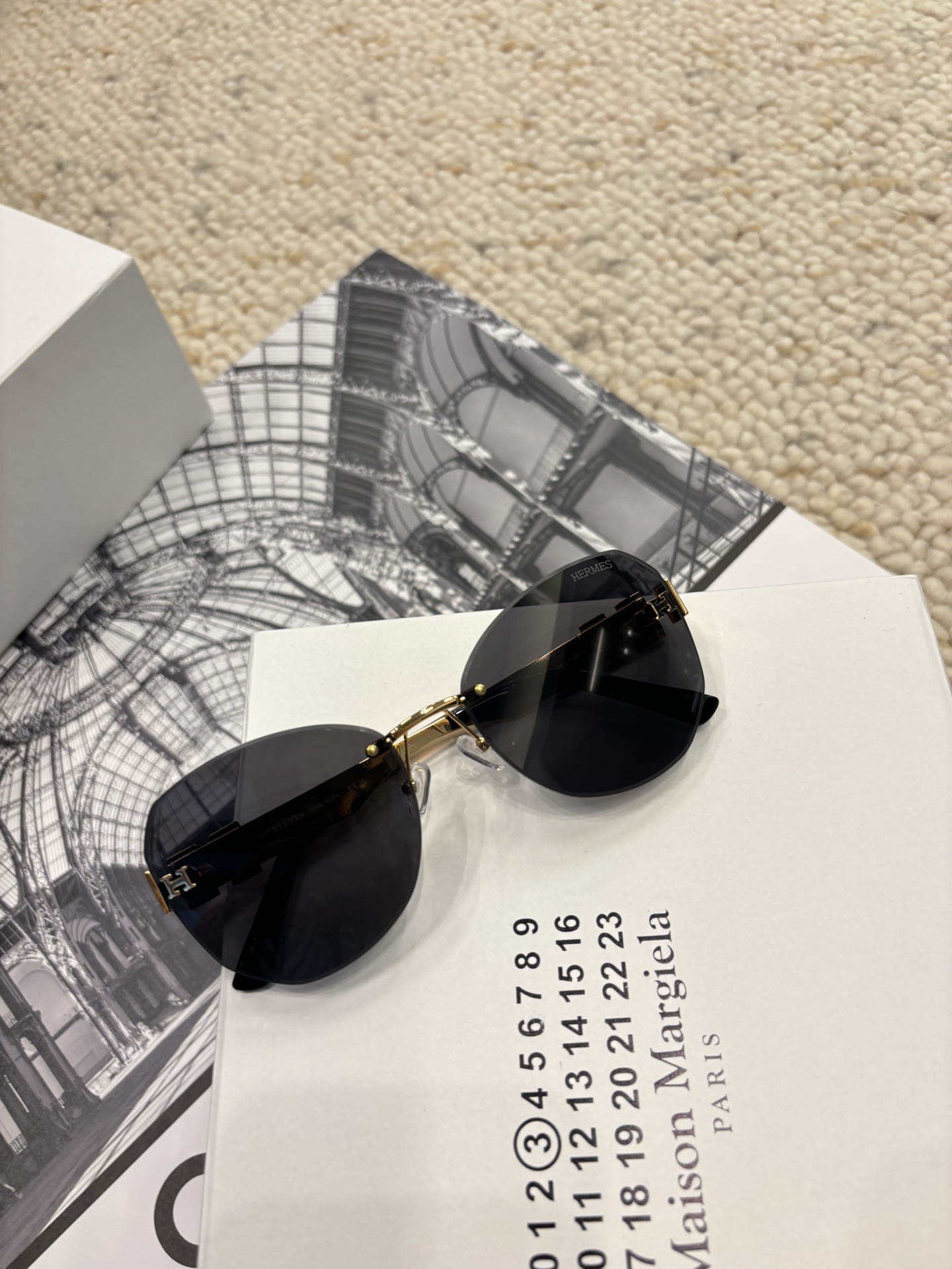 Hermès Black Rimless Pilot Sunglasses – Gold Accents