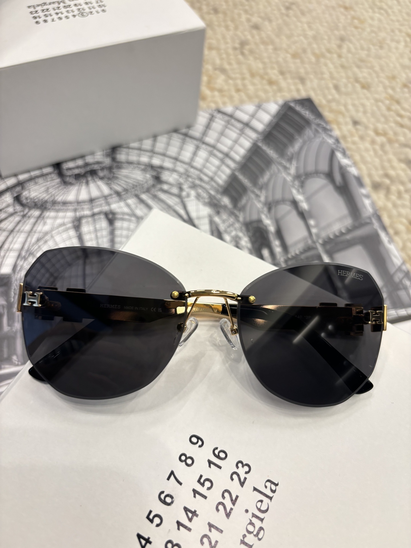 Hermes Rimless Designer Sunglasses with Gold H Logo Detail