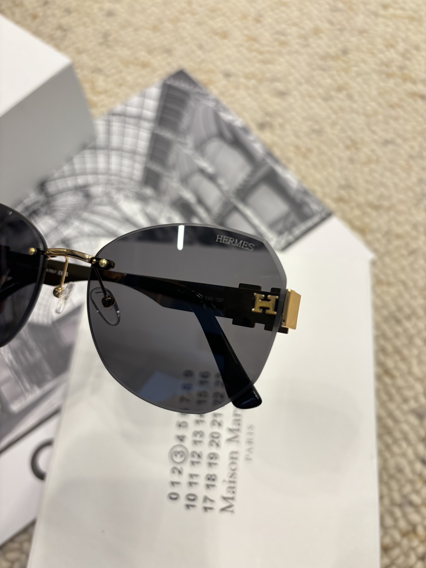 Hermes Rimless Designer Sunglasses with Gold H Logo Detail