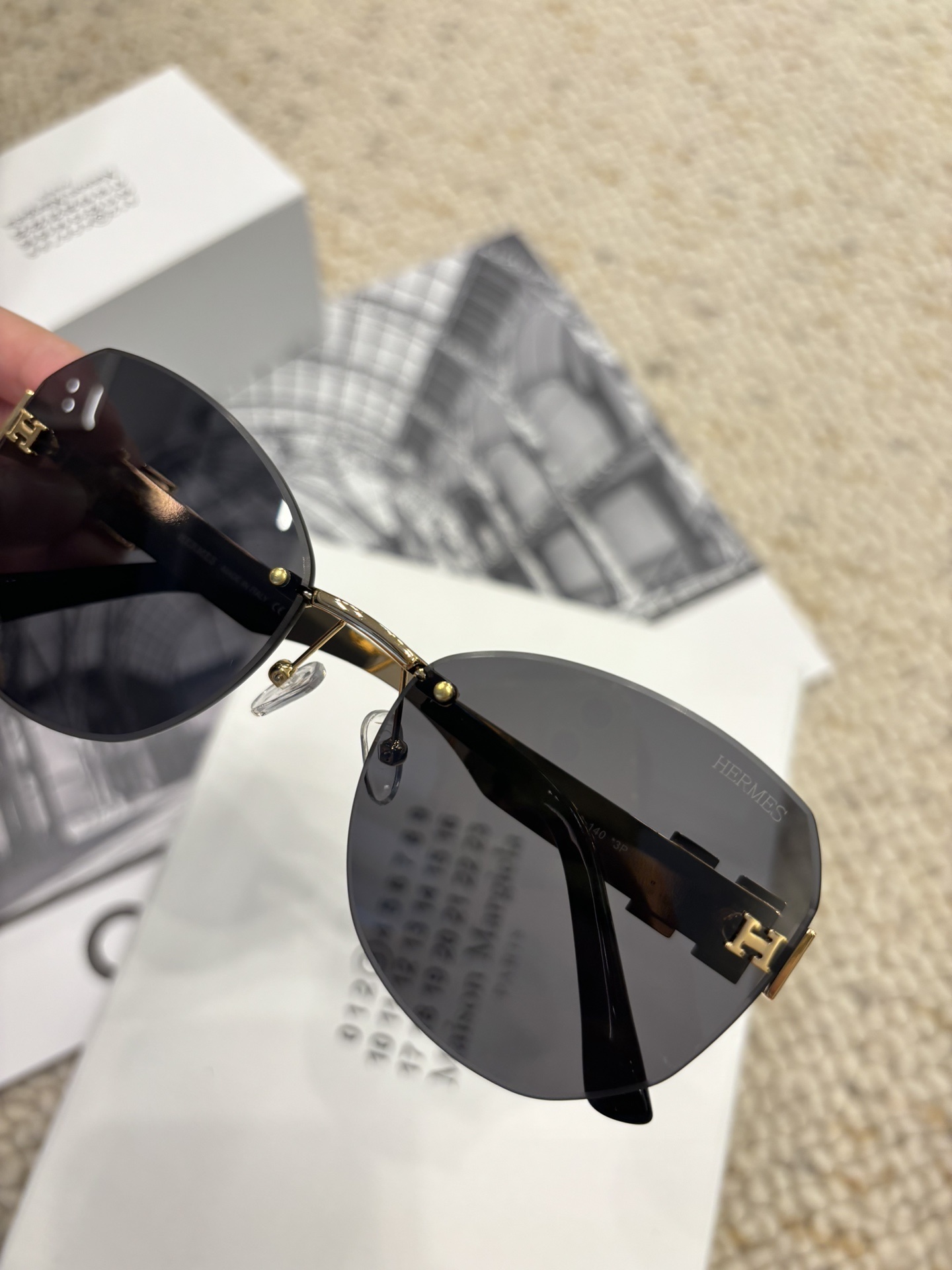 Hermes Rimless Designer Sunglasses with Gold H Logo Detail