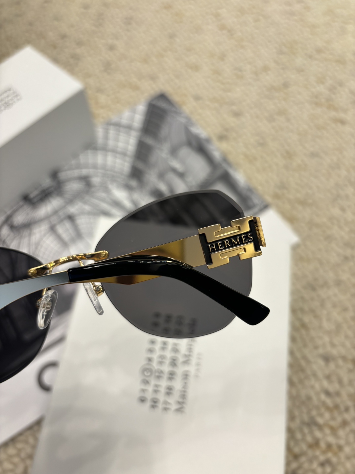 Hermes Rimless Designer Sunglasses with Gold H Logo Detail