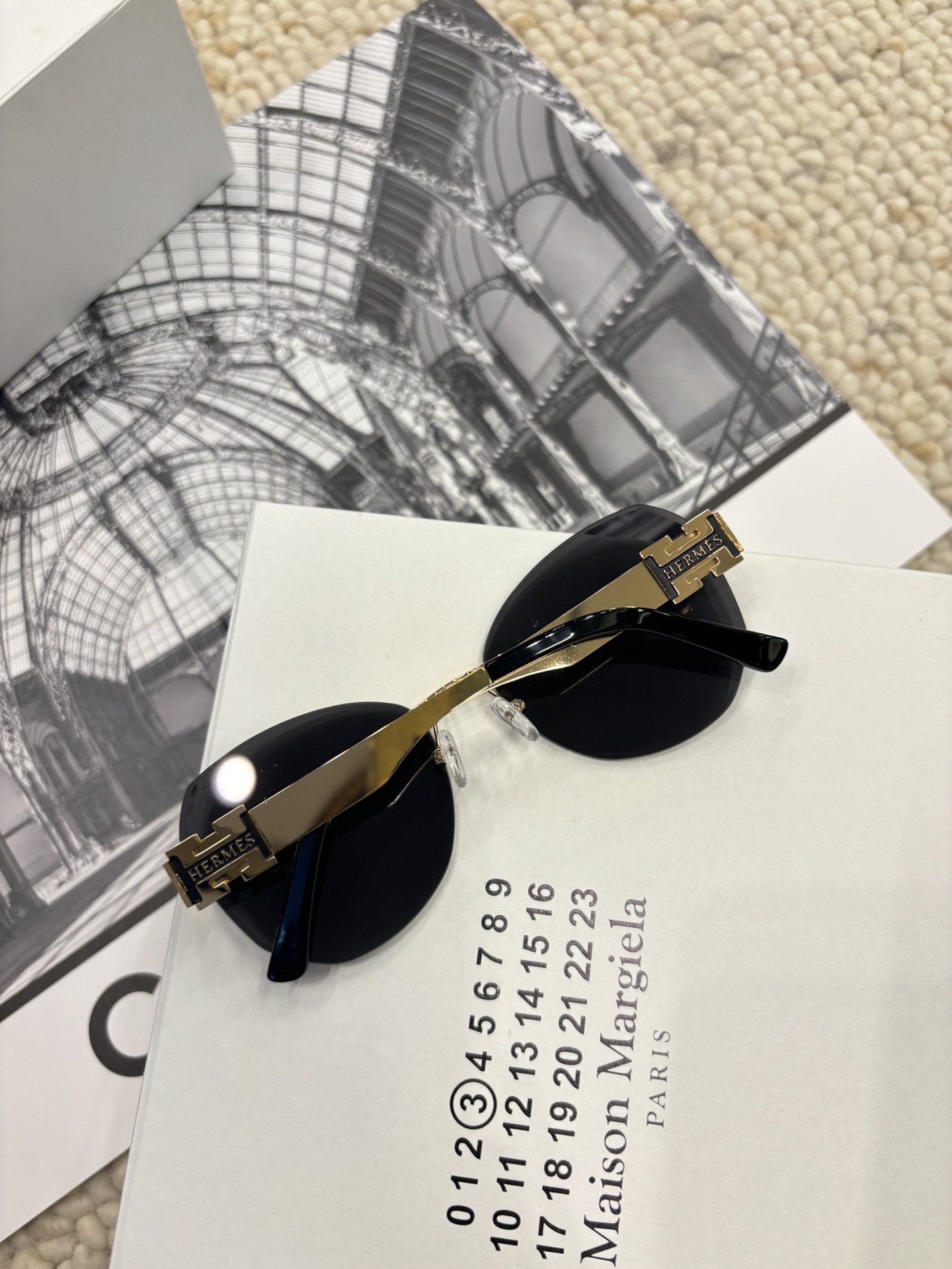 Hermes Rimless Designer Sunglasses with Gold H Logo Detail