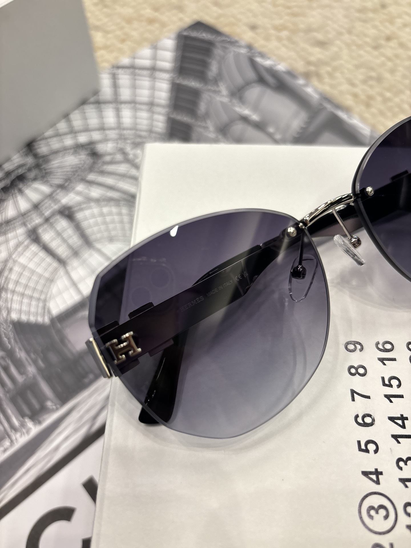 Hermes Luxury Rimless Sunglasses – Gradient Tint with H Logo