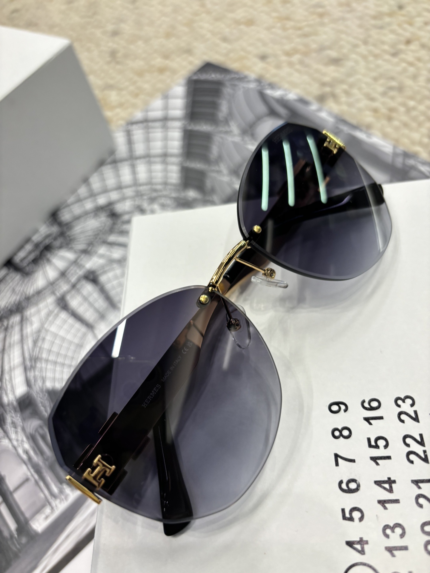 Hermès Luxury Rimless Sunglasses with Gold H Logo Gradient Lenses