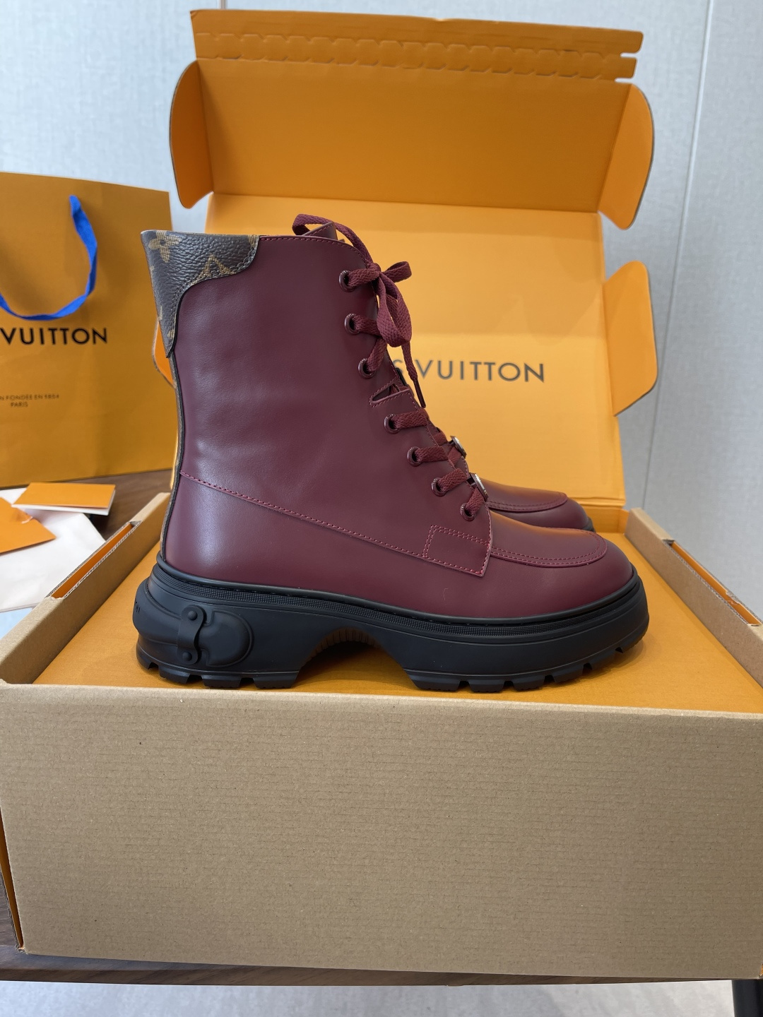 Louis Vuitton Women's Burgundy Leather Ankle Boots with LV Logo