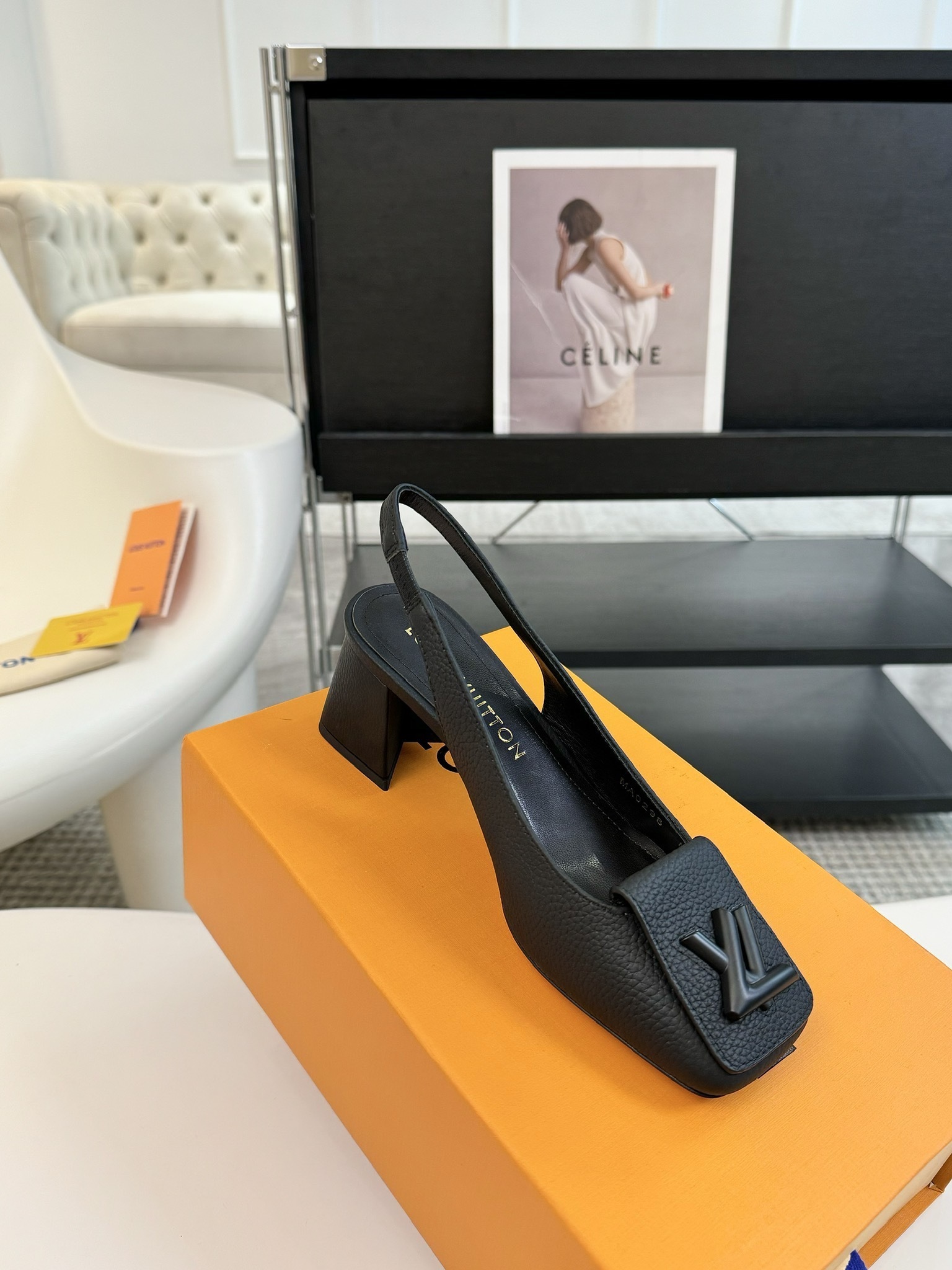 Louis Vuitton Black Grained Leather Slingback Pumps with LV Logo