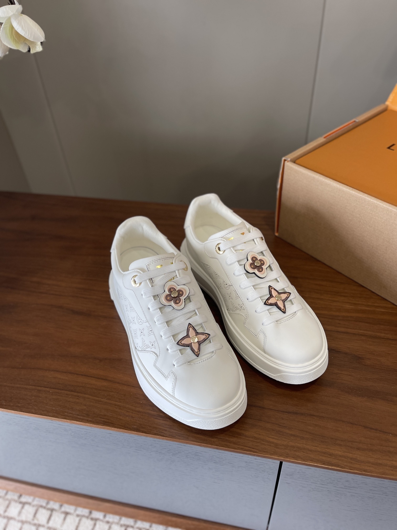 Louis Vuitton Time Out White Leather Sneakers with Monogram Charms