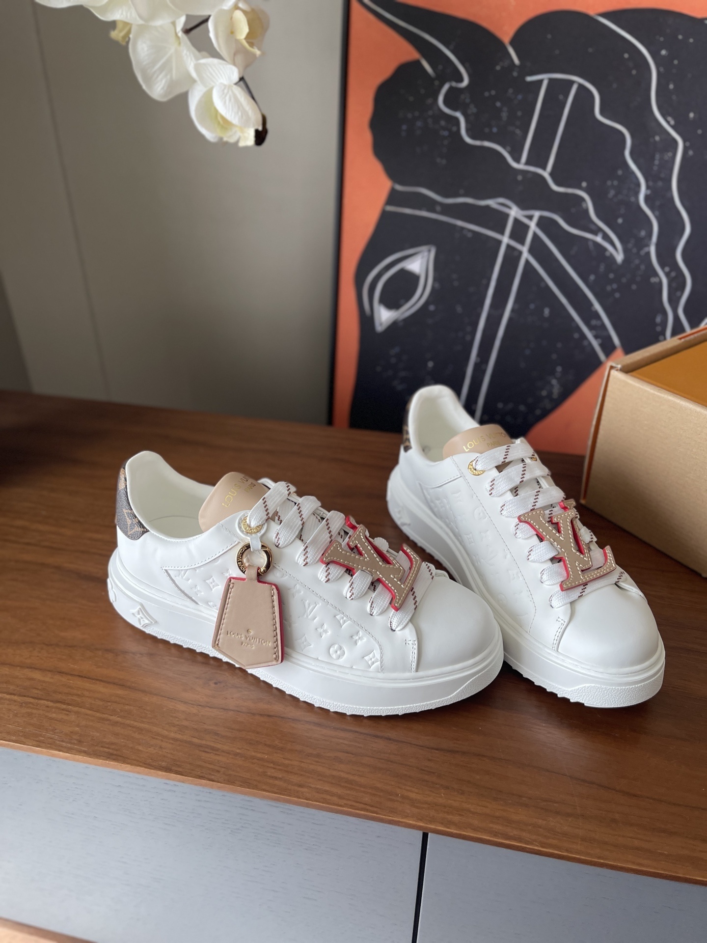 Louis Vuitton Time Out White Monogram Embossed Leather Sneakers