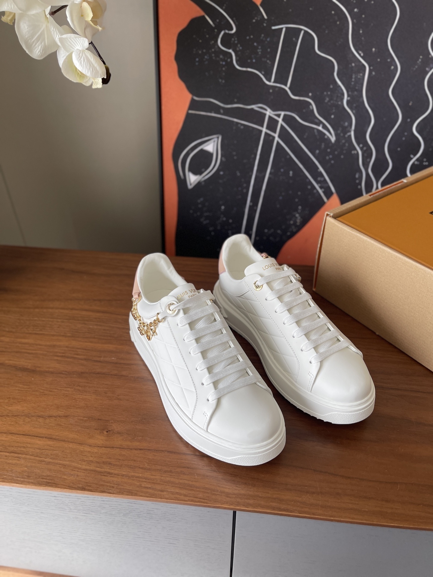 Louis Vuitton Women's White Quilted Platform Sneakers with Gold Charms