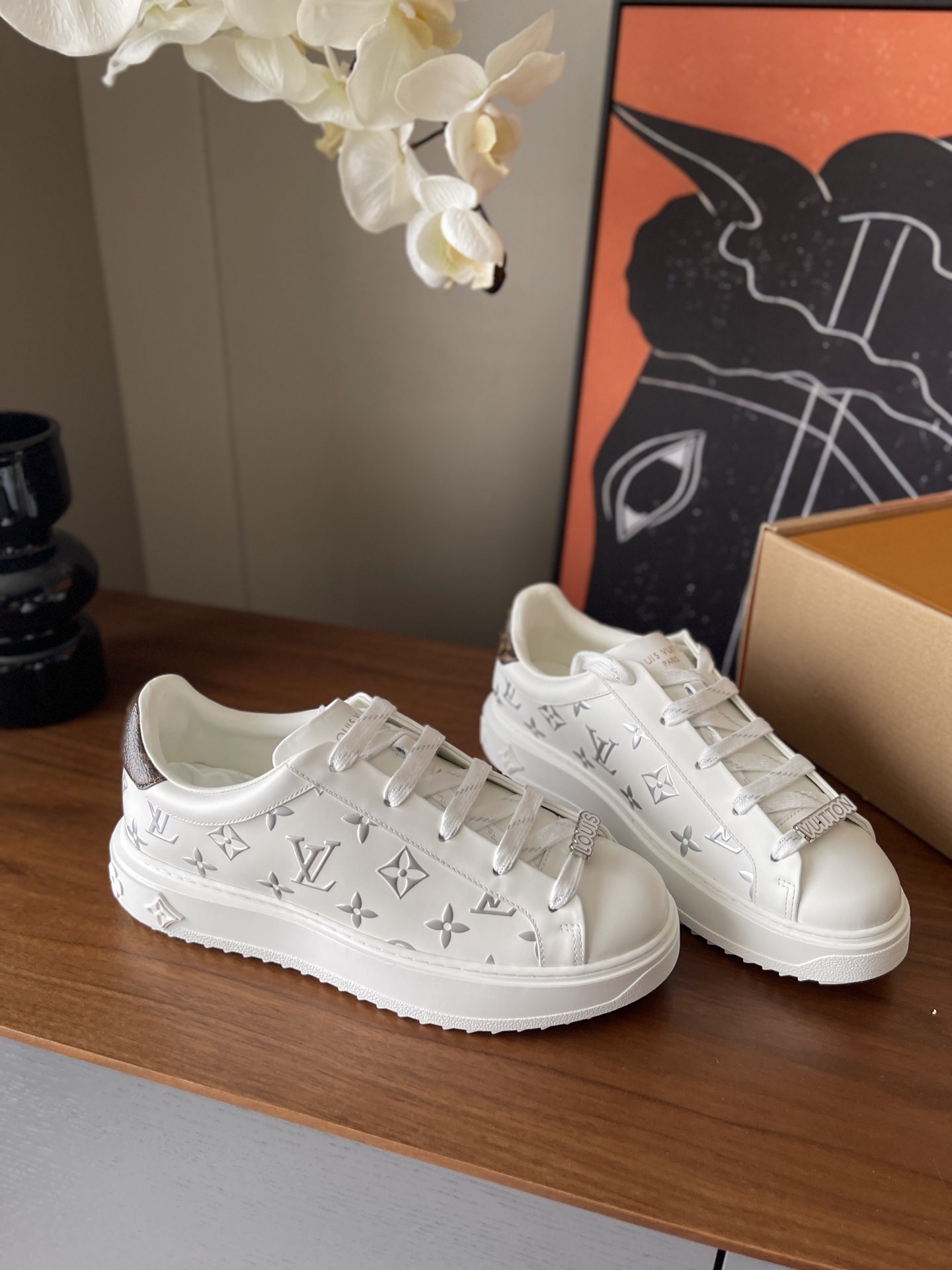 Louis Vuitton White Leather Monogram Embossed Low-Top Sneakers