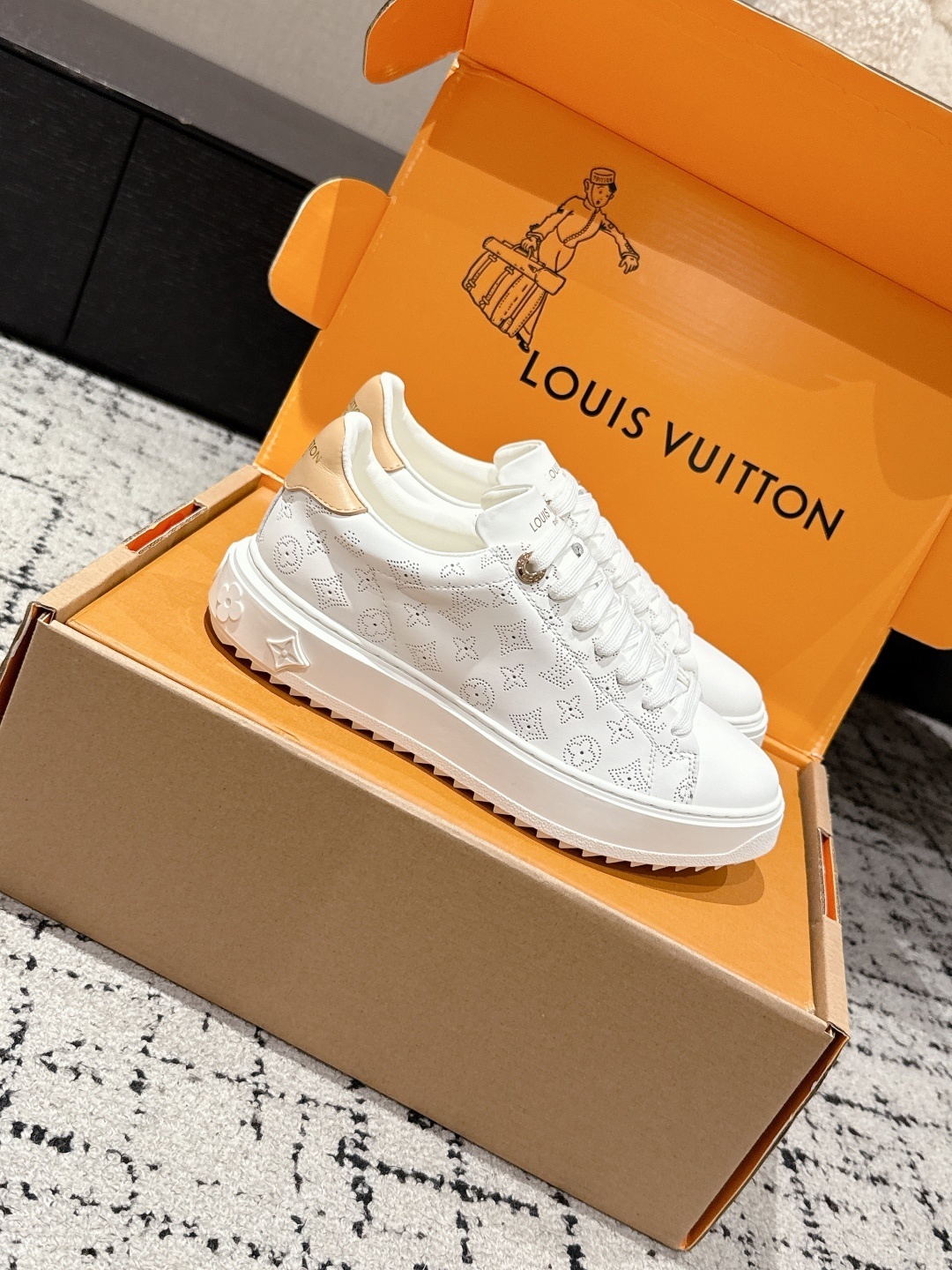 Louis Vuitton White Monogram Embossed Leather Low-Top Sneakers
