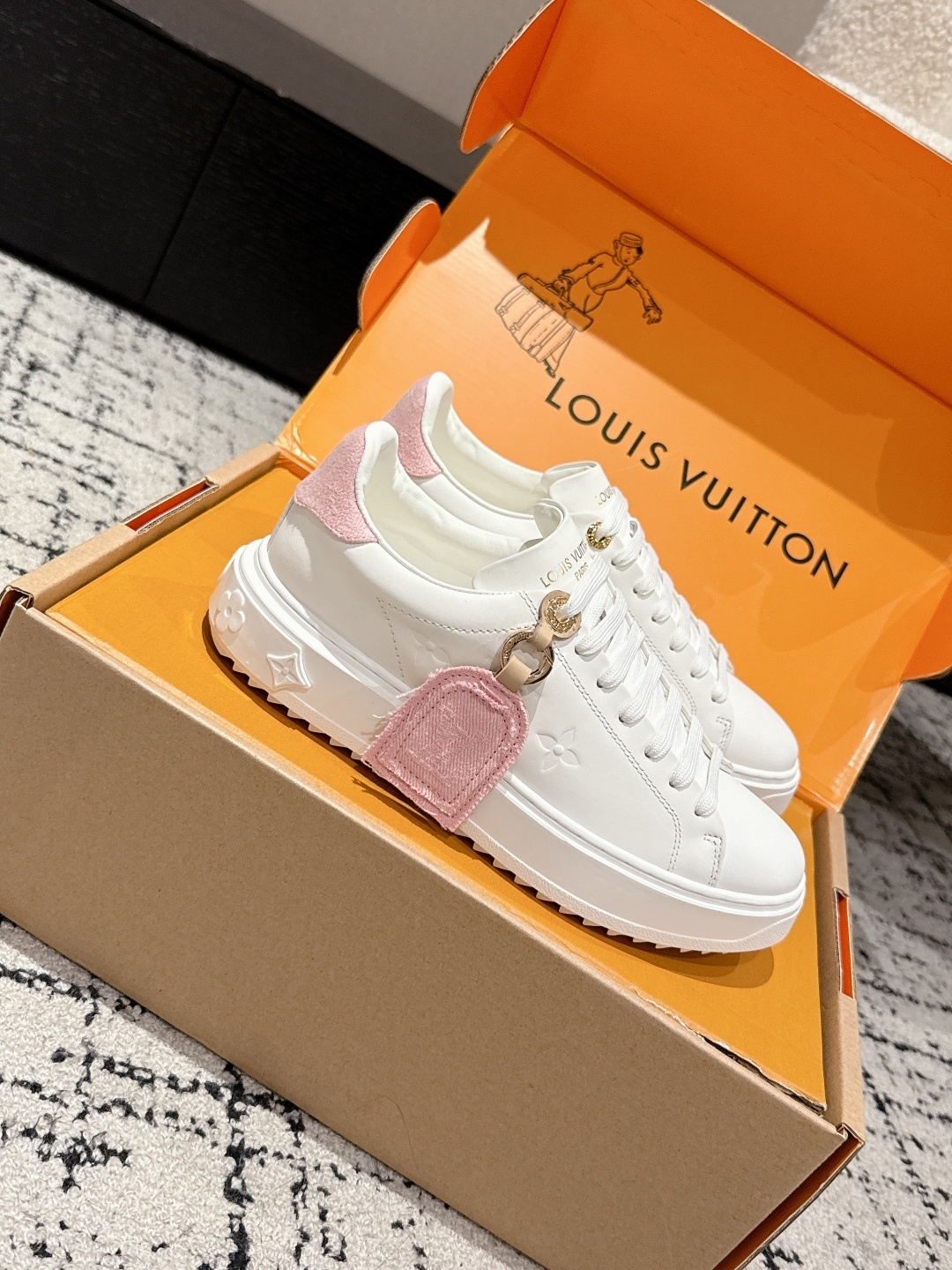 Louis Vuitton Women's White Leather Sneakers with Pink Accents