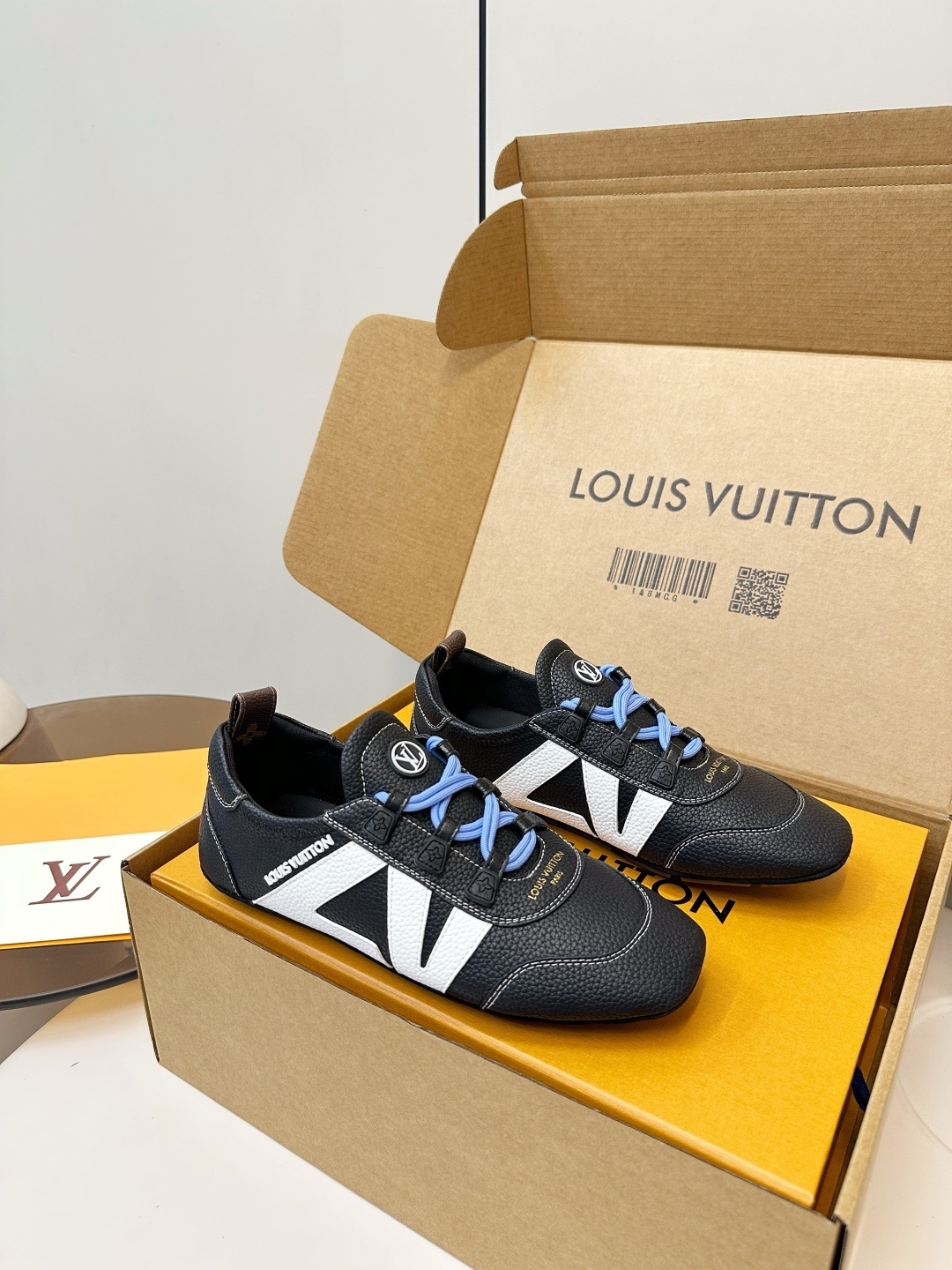 Louis Vuitton Men's Black Textured Leather Sneakers with Blue Laces
