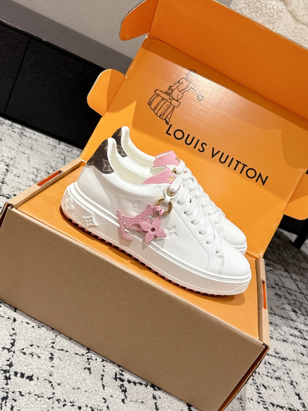 Louis Vuitton Women's White Leather Sneakers with Pink Accents