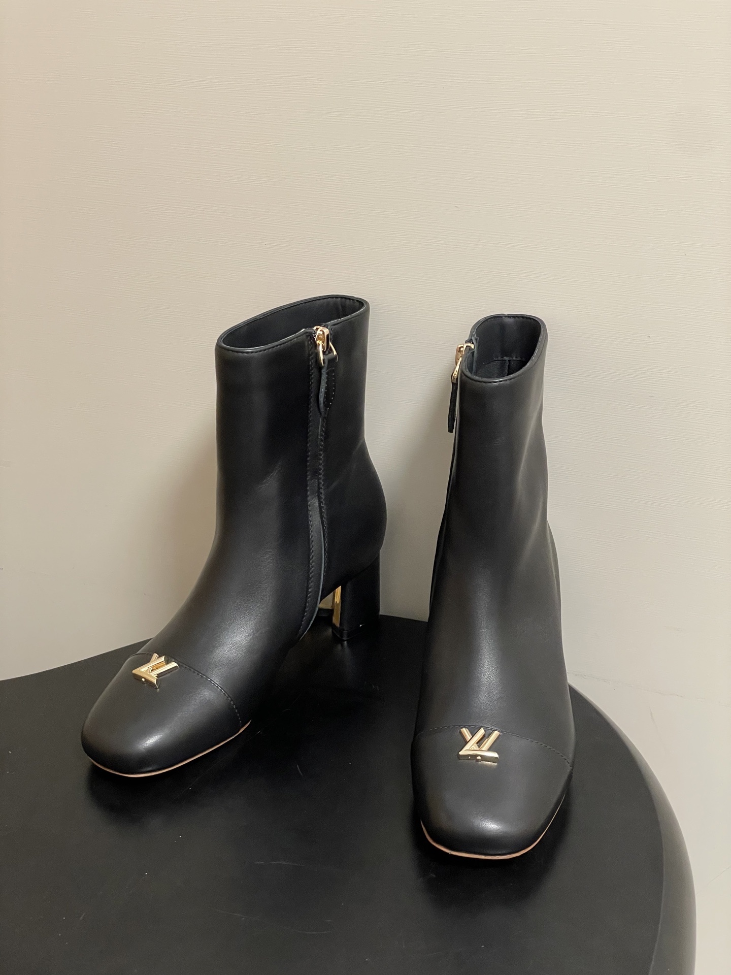 Louis Vuitton Black Leather Ankle Boots with Gold LV Logo & Block Heel