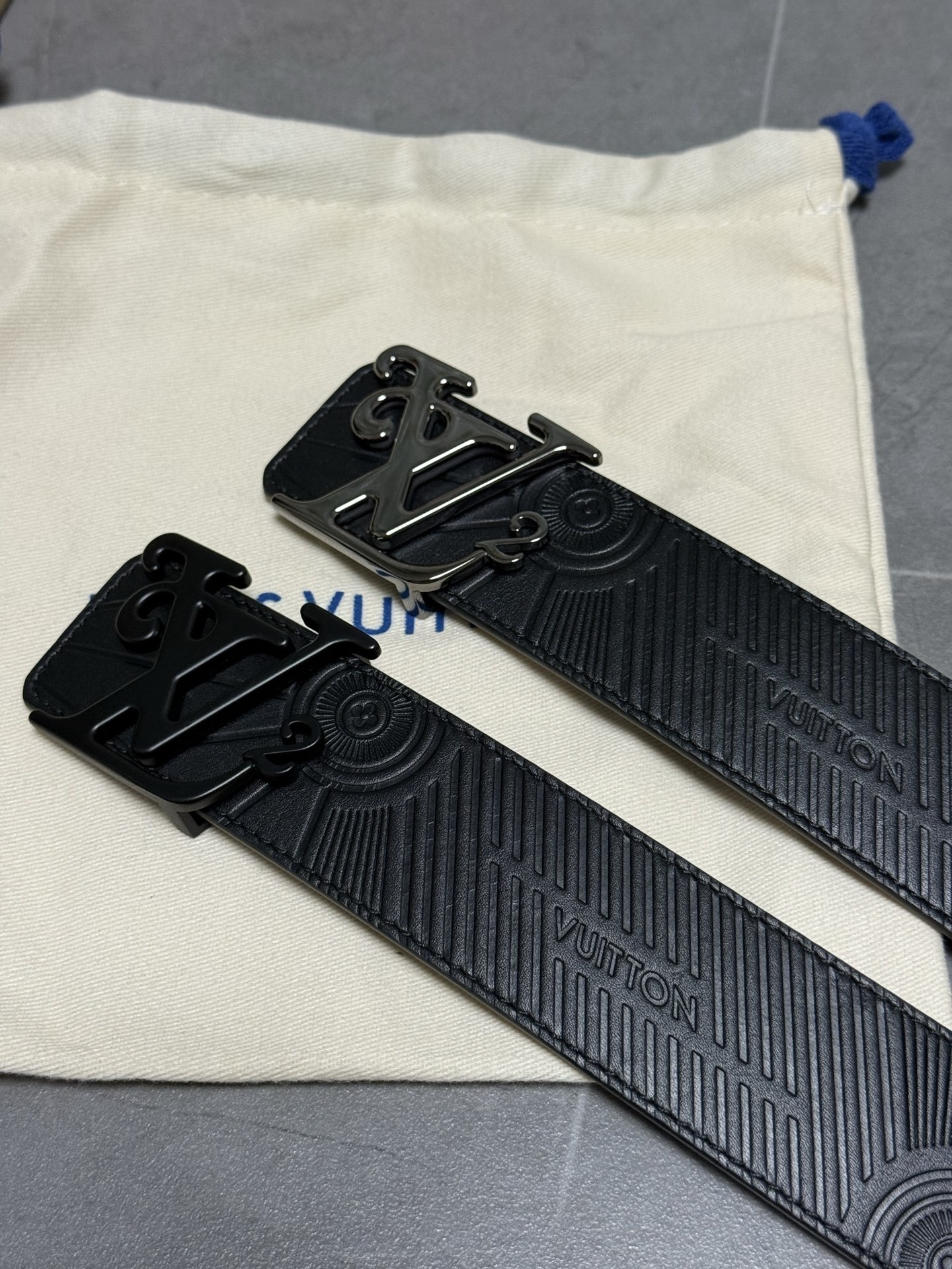 Louis Vuitton Black Embossed Leather Belt with Stylized LV Buckle