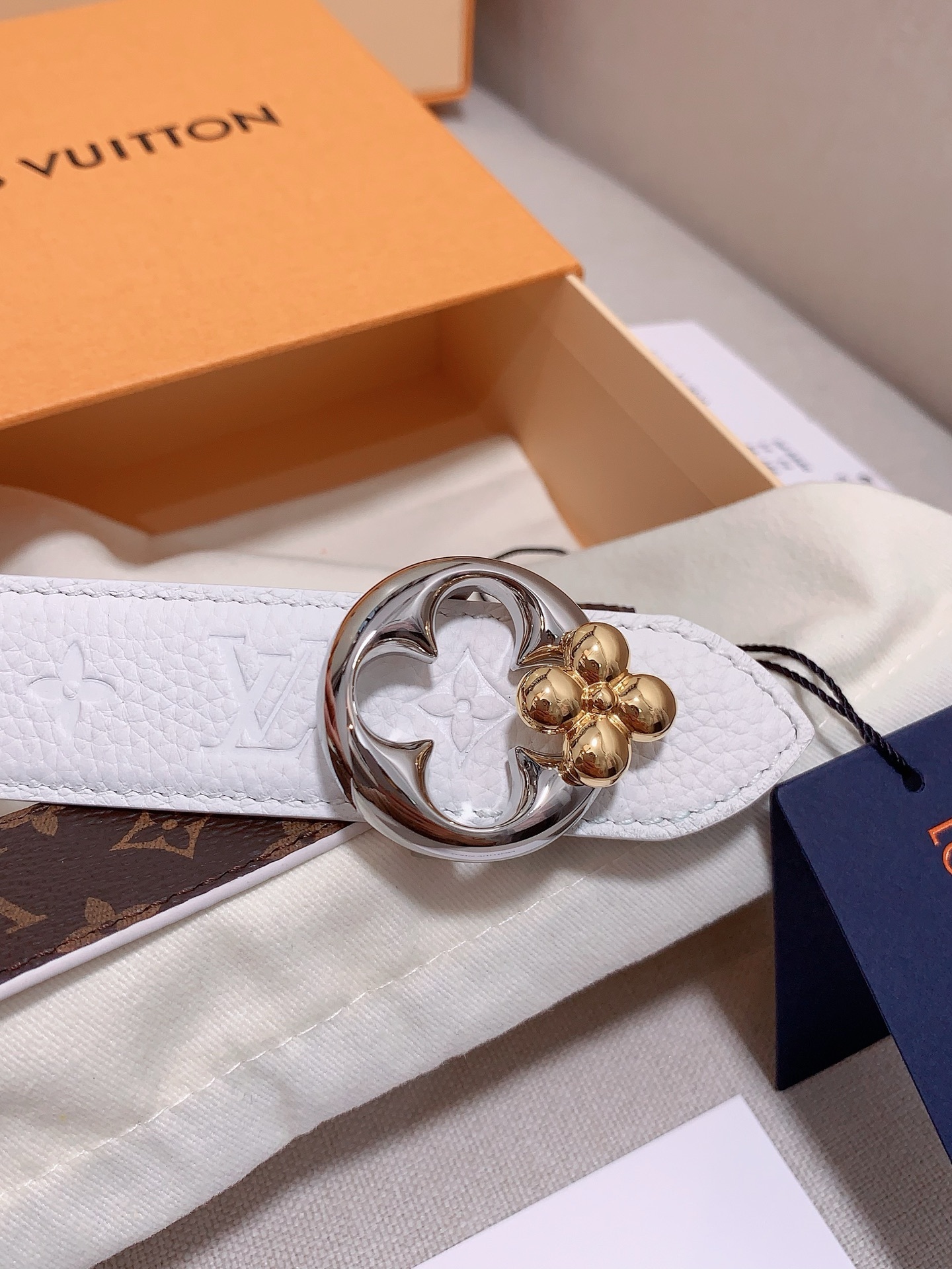 LV Monogram Empreinte White Leather Belt with Gold Flower Buckle