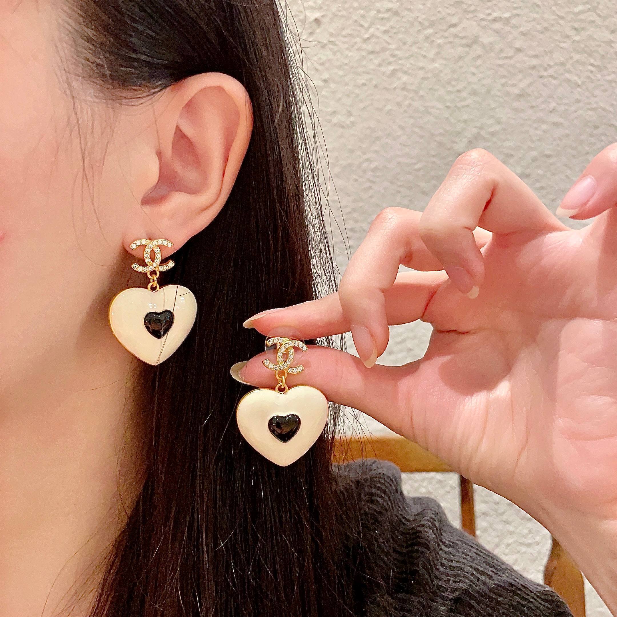 Chanel Cream Heart Black Logo Earrings – Designer Chic