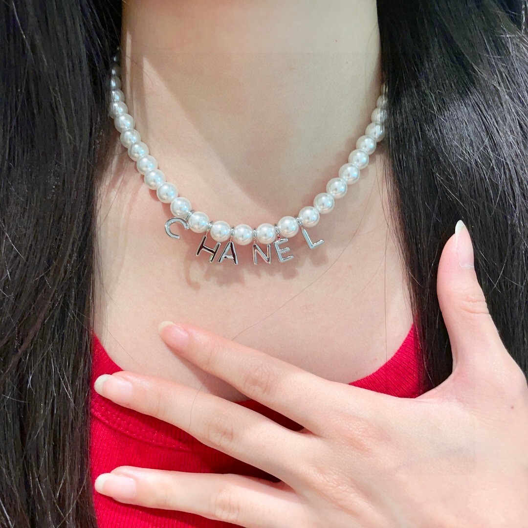 Chanel Silver Letter Pearl Necklace – Iconic Design